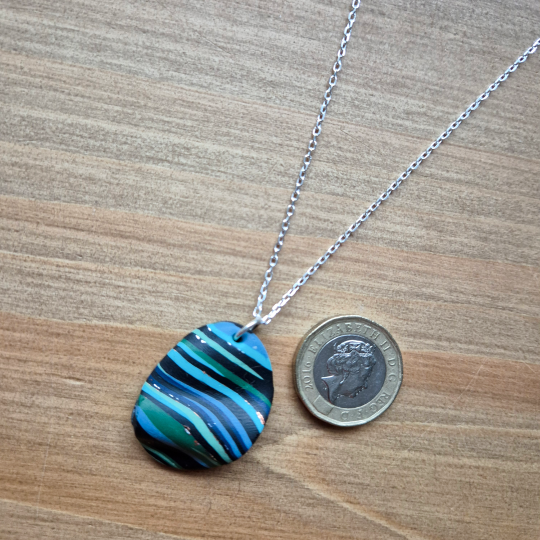 Dark River Ripple Oval: Handmade Pendant