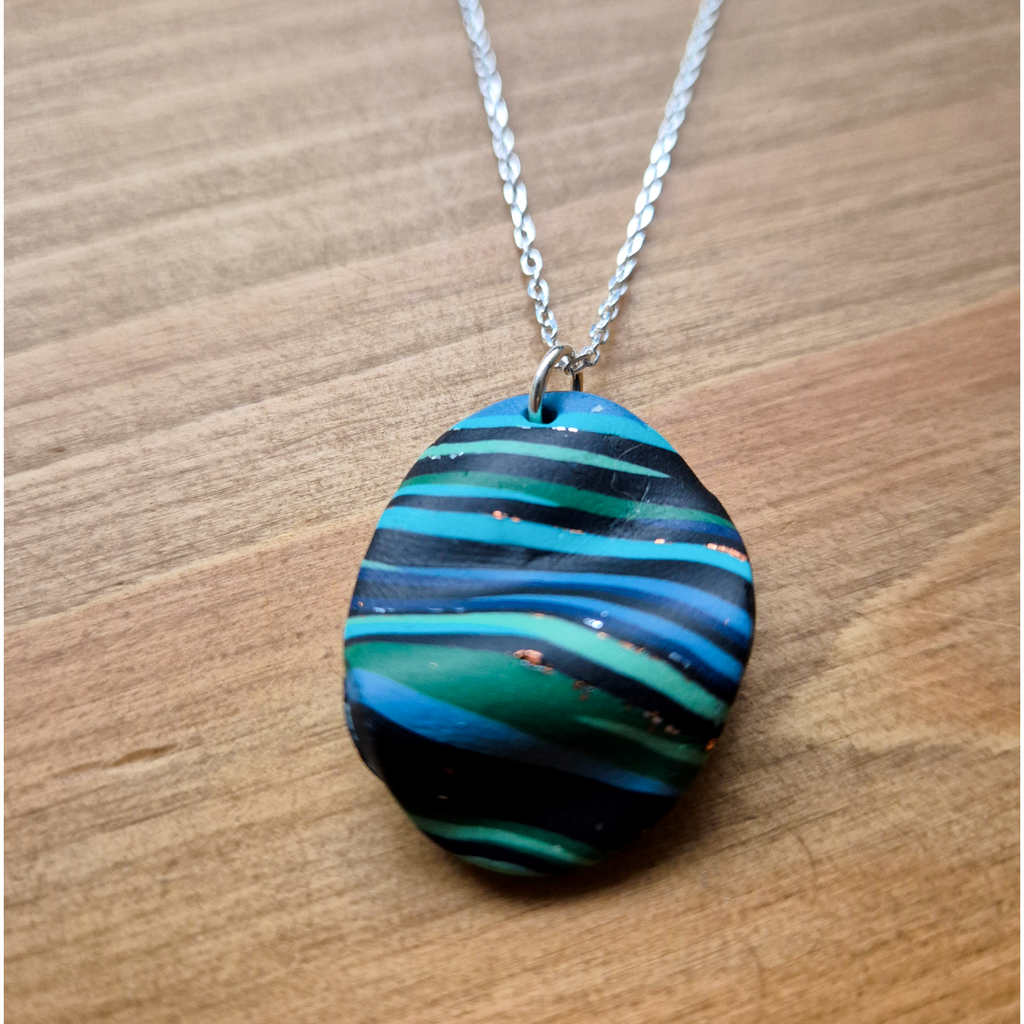 Dark River Ripple Oval: Handmade Pendant