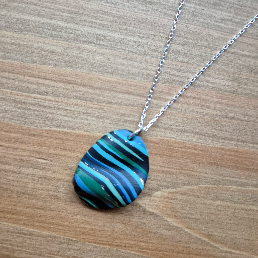Dark River Ripple Oval: Handmade Pendant