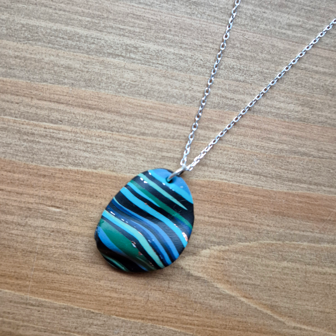 Dark River Ripple Oval: Handmade Pendant